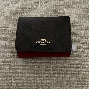 NEVER BEEN USED- original dark brown & red wallet